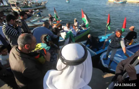Palestinians take part in a rally ahead of the commemorations of the 67th anniversary of the ''Nakba'', at the Gaza seaport on May 7, 2015. ''Nakba'' means in Arabic ''catastrophe'' in reference to the birth of the state...