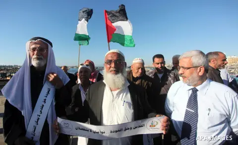 Palestinians take part in a rally ahead of the commemorations of the 67th anniversary of the ''Nakba'', at the Gaza seaport on May 7, 2015. ''Nakba'' means in Arabic ''catastrophe'' in reference to the birth of the state...