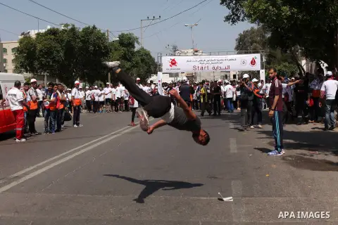Palestinians take part in a marathon to mark the International Thalassemia Day Gaza city, May 9, 2015. Thalassemia is a genetic disease of the blood that patients cannot produce enough hemoglobin, the substance in red bl...