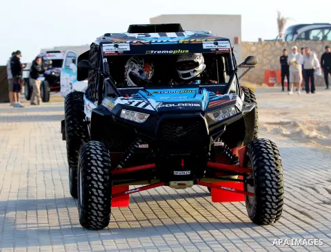 Egyptian drivers take part during Pharaohs motor rally in Hurghada, Egypt, on May 12, 2015. Photo by Amr Sayed