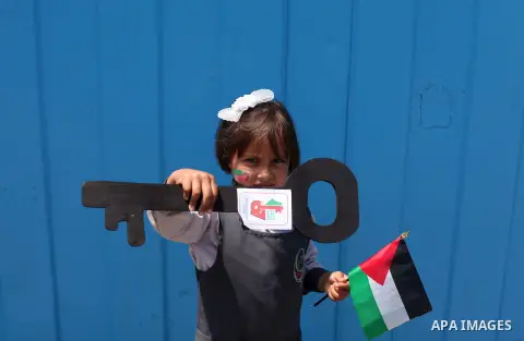 Palestinian children take part in a march ahead of the commemorations of the 67th anniversary of the ''Nakba'', in Gaza city on May 13, 2015. ''Nakba'' means in Arabic ''catastrophe'' in reference to the birth of the sta...