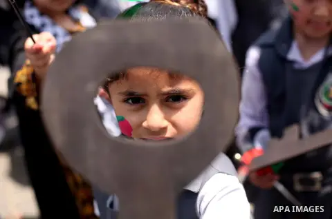 Palestinian children take part in a march ahead of the commemorations of the 67th anniversary of the ''Nakba'', in Gaza city on May 13, 2015. ''Nakba'' means in Arabic ''catastrophe'' in reference to the birth of the sta...