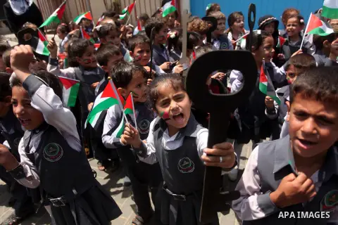 Palestinian children take part in a march ahead of the commemorations of the 67th anniversary of the ''Nakba'', in Gaza city on May 13, 2015. ''Nakba'' means in Arabic ''catastrophe'' in reference to the birth of the sta...
