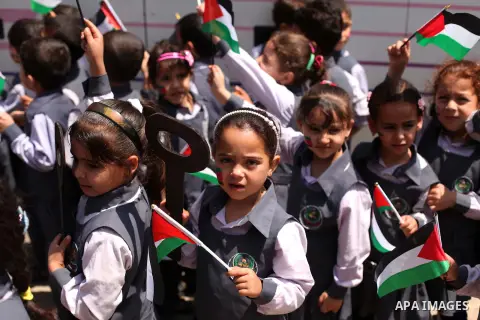 Palestinian children take part in a march ahead of the commemorations of the 67th anniversary of the ''Nakba'', in Gaza city on May 13, 2015. ''Nakba'' means in Arabic ''catastrophe'' in reference to the birth of the sta...
