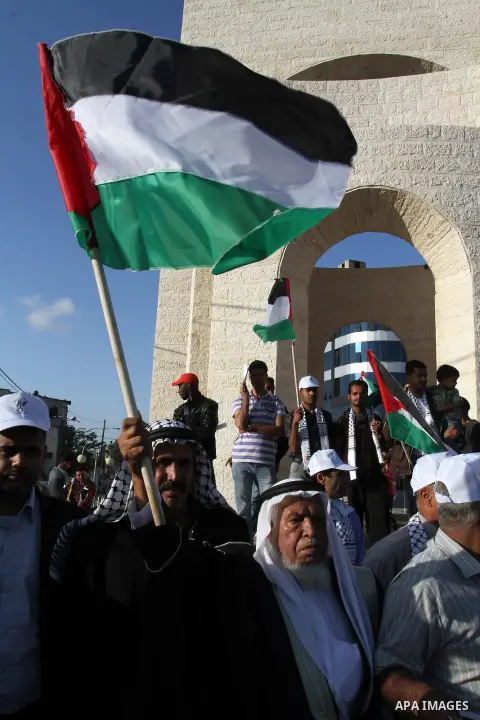 Palestinians take part in a rally ahead of the commemorations of the 67th anniversary of the ''Nakba'', in Khan Younis in the southern Gaza Strip, on May 14, 2015. ''Nakba'' means in Arabic ''catastrophe'' in reference t...