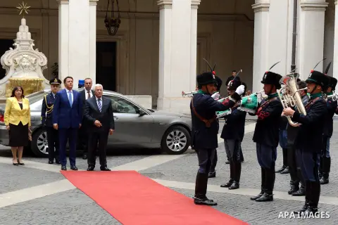 Palestinian President Mahmoud Abbas meets with Italian Prime Minister Matteo Renzi, at the Chigi Palace in Rome on May 15, 2015. Abbas arrived in Rome for three days of meetings with Italian government institutions and t...
