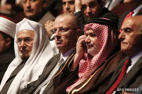 Palestinian Prime Minister Rami Hamdallah (C) takes part in the 6th annual conference of Jerusalem, in the West Bank city of Bethlehem on May 19, 2015. Photo by Shadi Hatem
