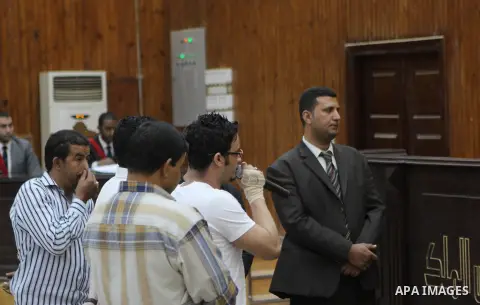 Members of Egyptian 'Ultras of Raba'wi' attend their trial in a court in Cairo, on May 24, 2015. Photo by Stringer
