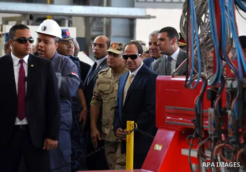 A handout picture provided by the Office of the Egyptian Presidency shows Egyptian President, Abdel Fattah al-Sisi attends the opening ceremony of Alexandria arsenal in Alexandria, Egypt on May 30, 2015. Photo by Egyptia...