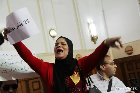 Supporter of former Egyptian President, Hosni Mubarak, react at the High Court, Cairo, Egypt, 04 June 2015. Egypt's highest appeals court on 04 June ordered a retrial for former president Mubarak on charges relating to t...