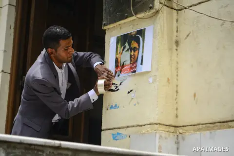Egyptian lawyers burn pictures of Interior Minister Magdi Abdel Ghaffar, during a protest in front of the syndicate lawyers, Cairo, on June 6, 2015. Photo by Amr Sayed