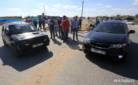 Palestinian drivers take part in a local car race in Gaza city on June 12, 2015. The race organized by Gaza racing club participant by 16 racer from the besieged coastal enclave. Photo by Mohammed Asad