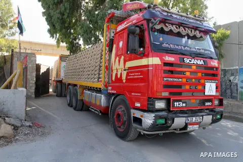 A truck loaded with cement enters the Gaza Strip from Egypt through the Rafah border crossing in southern Gaza Strip, on June 13, 2015. Egyptian authorities for the first time since the expulsion of Mohammed Morsi of the...