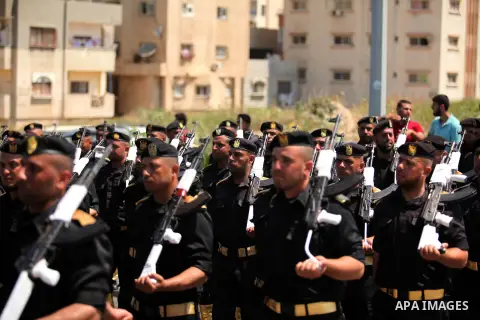 Members of the Palestinian Hamas security forces take part in a graduation ceremony in Gaza City on June 16, 2015. Photo by Ashraf Amra