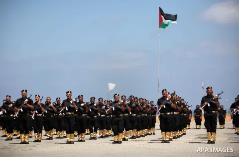 Members of the Palestinian Hamas security forces take part in a graduation ceremony in Gaza City on June 16, 2015. Photo by Ashraf Amra