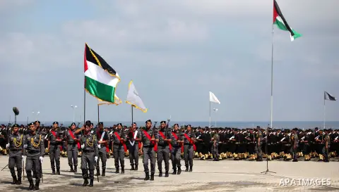Members of the Palestinian Hamas security forces take part in a graduation ceremony in Gaza City on June 16, 2015. Photo by Ashraf Amra