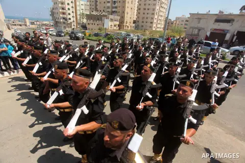 Members of the Palestinian Hamas security forces take part in a graduation ceremony in Gaza City on June 16, 2015. Photo by Ashraf Amra