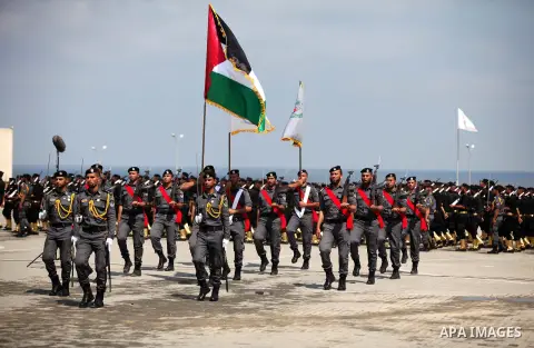 Members of the Palestinian Hamas security forces take part in a graduation ceremony in Gaza City on June 16, 2015. Photo by Ashraf Amra