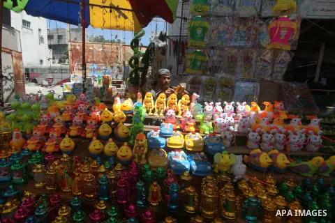 A Palestinian vendor displays traditional lanterns known in Arabic as "Fanous" sold during the Muslim holy month of Ramadan at a market in Gaza City, on June 17, 2015 as the faithful prepare to start fasting. More than 1...