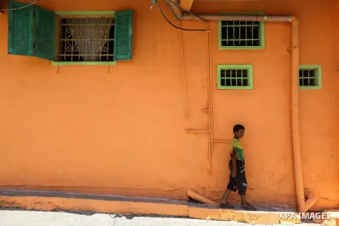 A photo taken on June 17, 2015 shows colored houses in the old city of Gaza, as Palestinians colored the walls of houses in the area to prepare for the start of the Muslim holy fasting month of Ramadan. More than 1.5 bil...