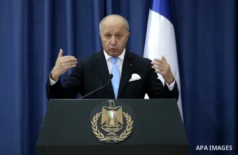 French Foreign minister Laurent Fabius speaks during a joint press conference with his Palestinian counterpart Riyad al-Malki in the West Bank city of Ramallah June 21, 2015. Prime Minister Benjamin Netanyahu prefaced ta...