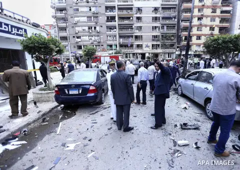 Forensic detectives gather at the site of a bomb that targeted the convoy of the Egyptian state prosecutor, Hisham Barakat, in the capital Cairo on June 29, 2015. Egypt's state prosecutor was wounded when a powerful bomb...