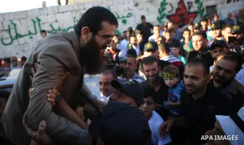 Palestinian Islamic Jihad leader Khader Adnan celebrates during a rally honoring him following his release, near the West Bank city of Jenin July 12, 2015. Israel on Sunday released Adnan from jail following a deal last...