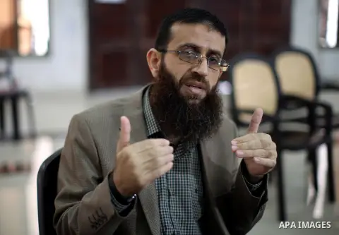 Palestinian Khader Adnan speaks to media in the West Bank village of Arrabeh near Jenin on July 14, 2015. Israeli police said they have detained Adnan again, just a day after he was released from Israeli custody. Police...