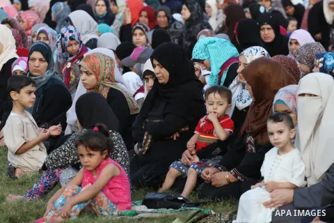 Palestinians attend Eid al-Fitr prayers at al-Saraya Square in Gaza City July 17, 2015. Eid al-Fitr marks the end of the Muslim holy month of Ramadan. Photo by Mohammed Asad