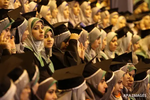 Palestinian students of the University collage of applied science, attend their graduation ceremony, in Gaza city on July 26, 2015. Photo by Mohammed Asad