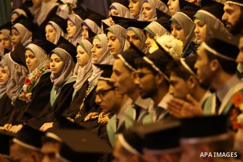 Palestinian students of the University collage of applied science, attend their graduation ceremony, in Gaza city on July 26, 2015. Photo by Mohammed Asad