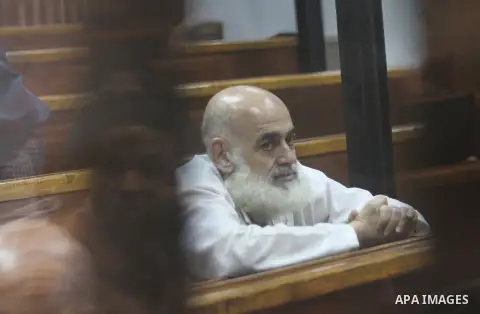 Members of Muslim Brotherhood group, attend their trial in a court in Cairo on July 27, 2015. Cairo Criminal court resumes on Monday, the trial of ousted President, Mohamed Morsi alongside 24 other prominent Brotherhood...