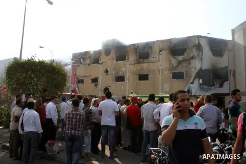 Egyptian firemen put out the flames after a fire broke out at the Al-Helw furniture factory north of the capital Cairo killing at least 19 working according to security and health workers on July 28, 2015. Security offic...