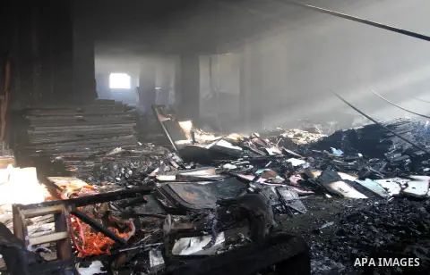Damage is seen after a fire broke out at the Al-Helw furniture factory north of the capital Cairo killing at least 19 working according to security and health workers on July 28, 2015. Security officials said the fire ra...