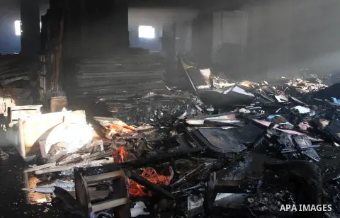 Damage is seen after a fire broke out at the Al-Helw furniture factory north of the capital Cairo killing at least 19 working according to security and health workers on July 28, 2015. Security officials said the fire ra...