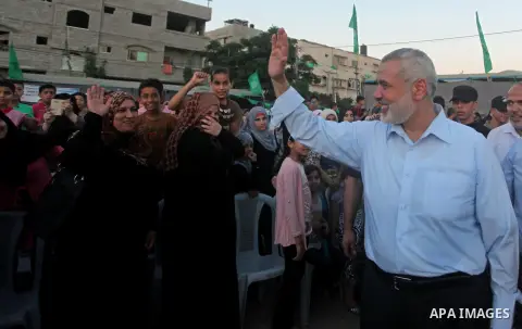 Senior Hamas leader Ismail Haniyeh, attends a military-style camp organized by his movement in Gaza City on July 28, 2015. Hamas's armed wing organized "Liberation Youths Camps" for young Palestinians aged between 15 and...