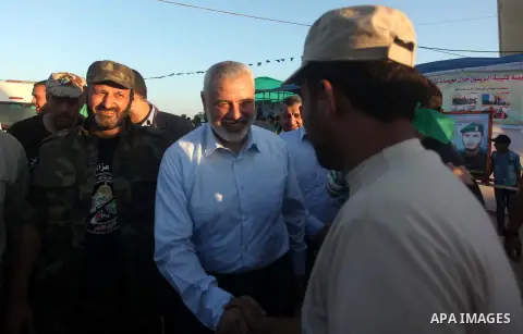 Senior Hamas leader Ismail Haniyeh, attends a military-style camp organized by his movement in Gaza City on July 28, 2015. Hamas's armed wing organized "Liberation Youths Camps" for young Palestinians aged between 15 and...