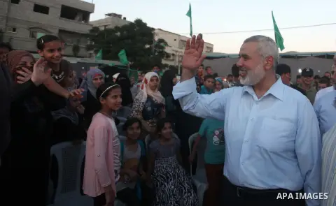 Senior Hamas leader Ismail Haniyeh, attends a military-style camp organized by his movement in Gaza City on July 28, 2015. Hamas's armed wing organized "Liberation Youths Camps" for young Palestinians aged between 15 and...