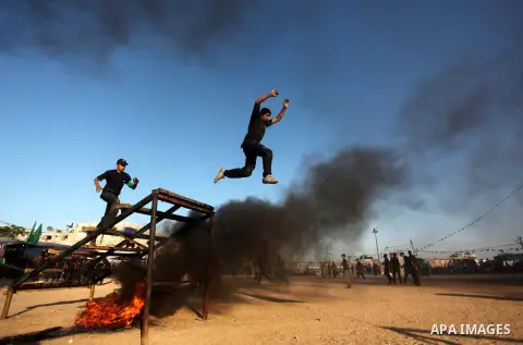 Palestinian youths demonstrate their skills during a military-style camp organized by the Hamas movement in Gaza City on July 28, 2015. Hamas's armed wing organized "Liberation Youths Camps" for young Palestinians aged b...