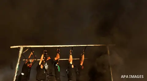 Palestinian youths demonstrate their skills during a military-style camp organized by the Hamas movement in Gaza City on July 28, 2015. Hamas's armed wing organized "Liberation Youths Camps" for young Palestinians aged b...