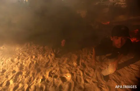 Palestinian youths demonstrate their skills during a military-style camp organized by the Hamas movement in Gaza City on July 28, 2015. Hamas's armed wing organized "Liberation Youths Camps" for young Palestinians aged b...