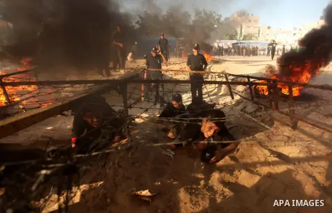Palestinian youths demonstrate their skills during a military-style camp organized by the Hamas movement in Gaza City on July 28, 2015. Hamas's armed wing organized "Liberation Youths Camps" for young Palestinians aged b...