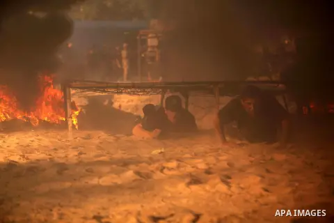 Palestinian youths demonstrate their skills during a military-style camp organized by the Hamas movement in Gaza City on July 28, 2015. Hamas's armed wing organized "Liberation Youths Camps" for young Palestinians aged b...