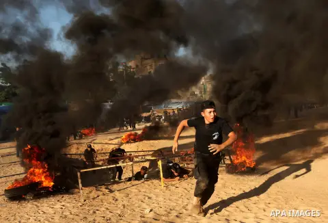 Palestinian youths demonstrate their skills during a military-style camp organized by the Hamas movement in Gaza City on July 28, 2015. Hamas's armed wing organized "Liberation Youths Camps" for young Palestinians aged b...