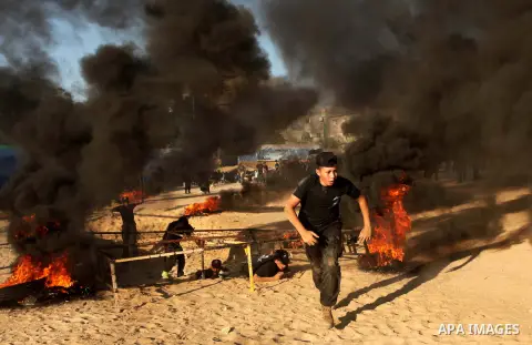 Palestinian youths demonstrate their skills during a military-style camp organized by the Hamas movement in Gaza City on July 28, 2015. Hamas's armed wing organized "Liberation Youths Camps" for young Palestinians aged b...