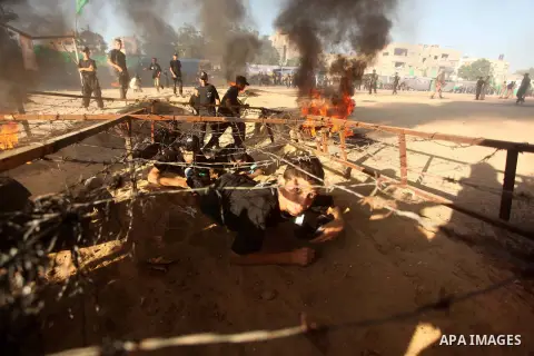 Palestinian youths demonstrate their skills during a military-style camp organized by the Hamas movement in Gaza City on July 28, 2015. Hamas's armed wing organized "Liberation Youths Camps" for young Palestinians aged b...