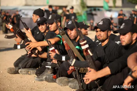 Palestinian youths demonstrate their skills during a military-style camp organized by the Hamas movement in Gaza City on July 28, 2015. Hamas's armed wing organized "Liberation Youths Camps" for young Palestinians aged b...