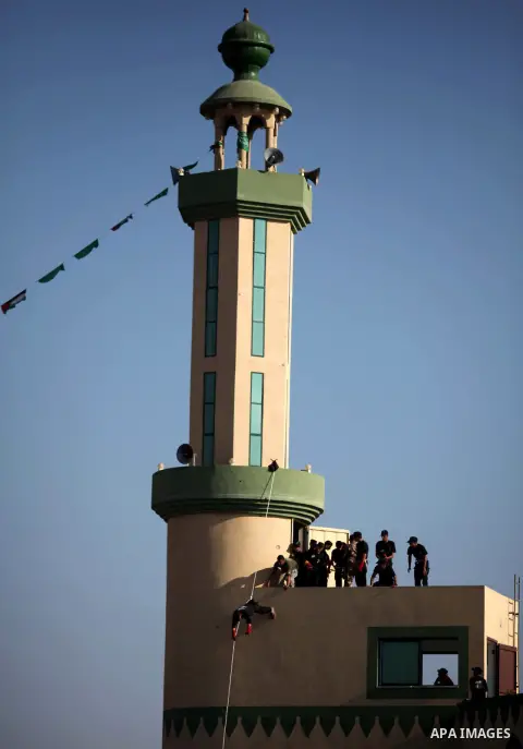 Palestinian youths demonstrate their skills during a military-style camp organized by the Hamas movement in Gaza City on July 28, 2015. Hamas's armed wing organized "Liberation Youths Camps" for young Palestinians aged b...