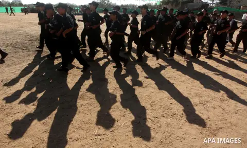 Palestinian youths demonstrate their skills during a military-style camp organized by the Hamas movement in Gaza City on July 28, 2015. Hamas's armed wing organized "Liberation Youths Camps" for young Palestinians aged b...