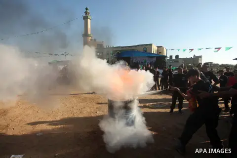 Palestinian youths demonstrate their skills during a military-style camp organized by the Hamas movement in Gaza City on July 28, 2015. Hamas's armed wing organized "Liberation Youths Camps" for young Palestinians aged b...